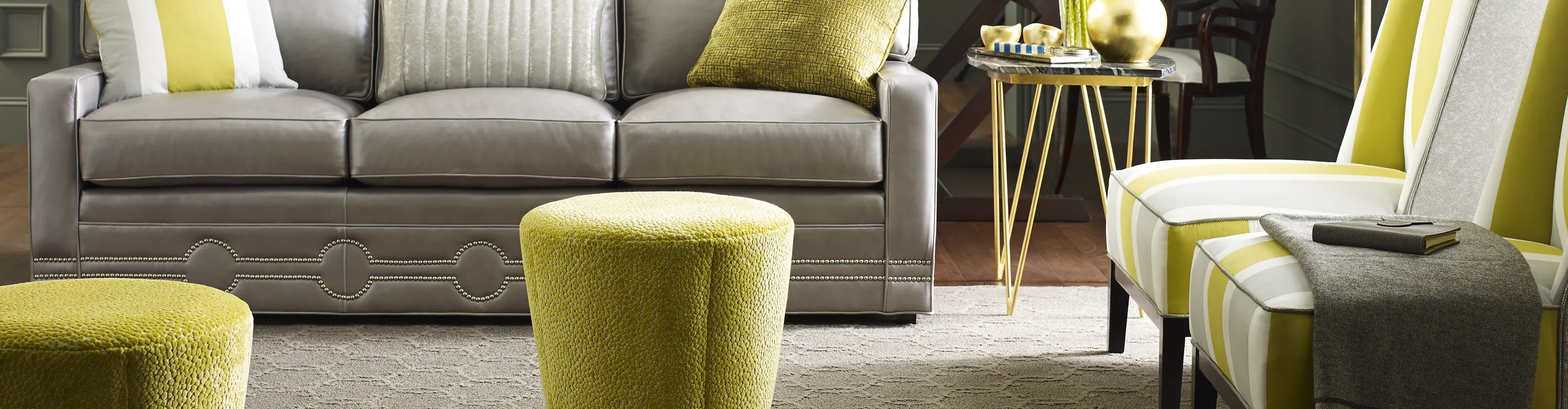 Cream area rug in living room with lime green accents